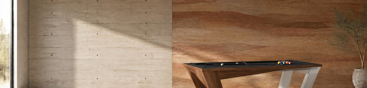 11 Ravens Avettore Convertible Pool Dining Ping Pong Table in a modern games room with a stamped concrete wall