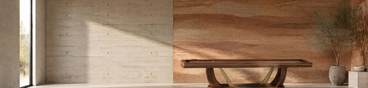 11 Ravens × Rubinacci Dining Chair in a modern games room with a stamped concrete wall