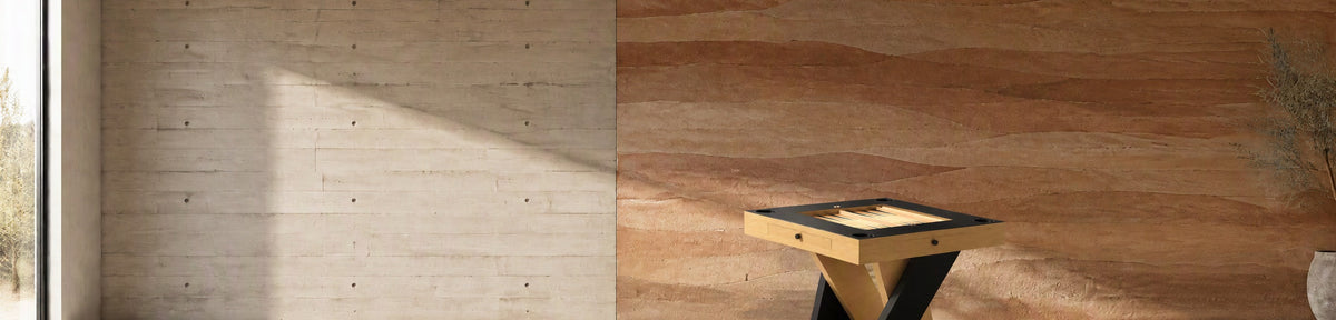 11 Ravens Avettore Chess & Card Table in a modern games room with a stamped concrete wall