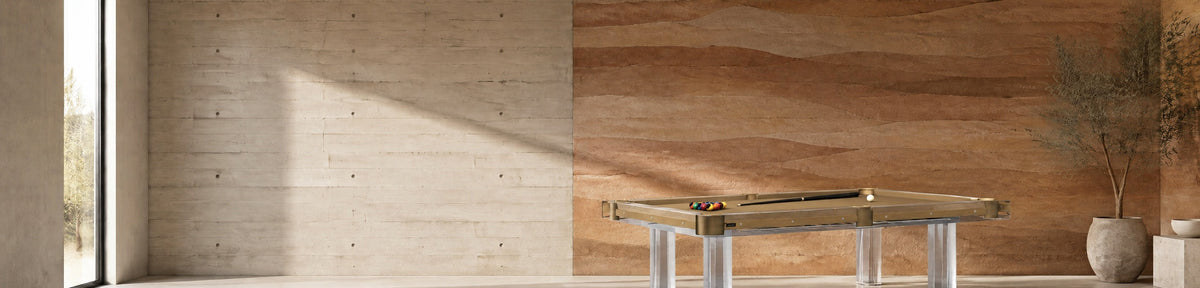 11 Ravens Avettore Lucite Pool Table in a modern games room with a stamped concrete wall