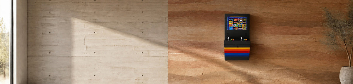Polycade Sente Arcade Cabinet in a modern games room with a stamped concrete wall