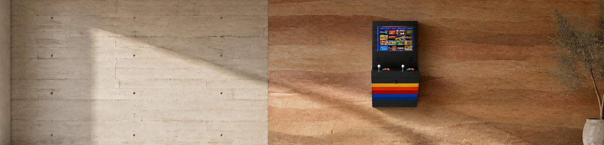 Polycade Sente Arcade Cabinet in a modern games room with a stamped concrete wall