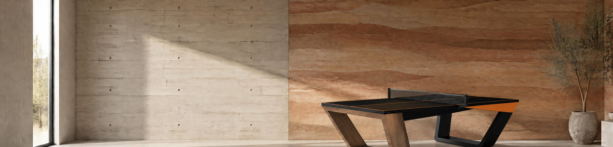 11 Ravens Avettore Convertible Pool Dining Ping Pong Table in a modern games room with a stamped concrete wall