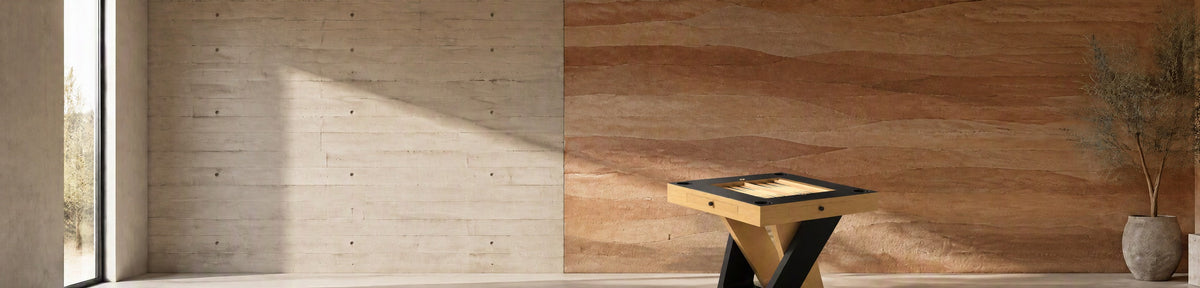 11 Ravens Avettore Chess & Card Table in a modern games room with a stamped concrete wall